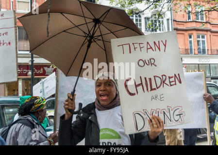 London, UK. 23rd April, 2016. People from the Kono district of Sierra Leone protest at Selfridges on Oxford St as part of a global demonstration against the financial partnership of Tiffany & Co with Octea, the largest diamond mining company in Sierra Leone. They say it defies all national and international legal norms and ethics thaat the company, wholly owned by Israeli billionaire, Benny Steinmetz and operated by former mercenaries has been allowed to operate without a licence and tax free, harming the local community who live around Credit:  Peter Marshall/Alamy Live News Stock Photo