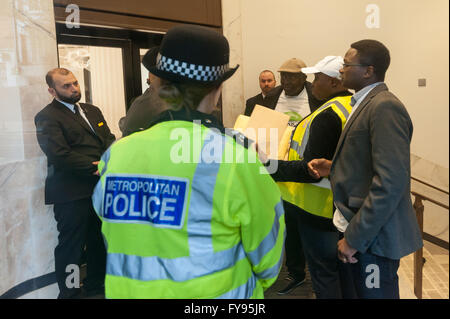 London, UK. 23rd April, 2016. Selfridges management refuse to accept a letter from protesters from the Kono district of Sierra Leone who are asking that they stop selling 'blood diamonds' from mines in Kondo. The protest was part of a global demonstration against the financial partnership of Tiffany & Co with Octea, the largest diamond mining company in Sierra Leone. Credit:  Peter Marshall/Alamy Live News Stock Photo