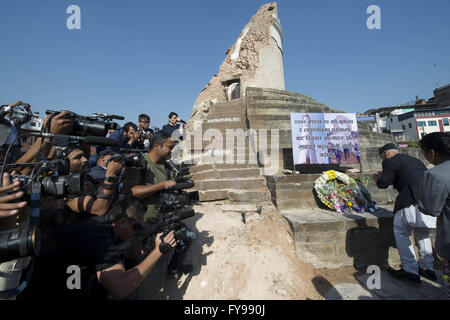 Kathmandu, Nepal. 24th Apr, 2016. Nepalese Prime Minister KP Sharma Oli (2nd R) mourns for the earthquake victims in front of the historical nine-storey tower Dharahara premise, which completely collapsed in the quake and killed over 100 people, in Kathmandu, capital of Nepal, on April 24, 2016. Nepalese Prime Minister KP Sharma Oli offered tributes to those who lost their lives in the April 25 earthquake last year and prayed for the peace of departed souls on Sunday, marking the first anniversary of the 7.9 magnitude devastating quake. Credit:  Cheong Kam Ka/Xinhua/Alamy Live News Stock Photo