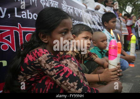 Dhaka. 24th Apr, 2016. Bangladeshi activists and relatives of victims in the collapse of the Rana Plaza building attend a protest rally on the third anniversary of the accident in Dhaka, Bangladesh, April 24, 2016. Bangladesh held ceremonies on Sunday to commemorate the victims of the country's worst-ever industrial tragedy which left at least 1,135 people dead, mostly garment workers. Credit:  Xinhua/Alamy Live News Stock Photo