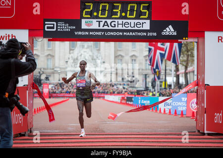 London, UK. 24th Apr, 2016. Men's Elite winner Eliud Kipchoge of Kenya crosses the finishing line during the London Marathon 2016 in London, Britain on April 24, 2016. Credit:  Richard Washbrooke/Xinhua/Alamy Live News Stock Photo