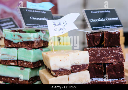 Various fudges on sale at a market stall: Bailey's Irish Cream, Chocolate Coconut and Cheesecake. Stock Photo