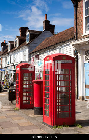 UK, Kent, Tenterden, Ashford Road, K6 phone boxes outside local shops Stock Photo