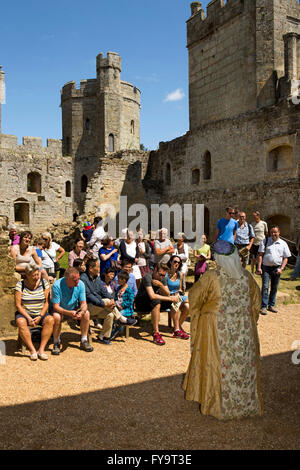 UK, East Sussex, Bodiam Castle, visitors listening to talk on medieval life Stock Photo