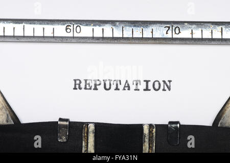 Word reputation typed on an old typewriter Stock Photo