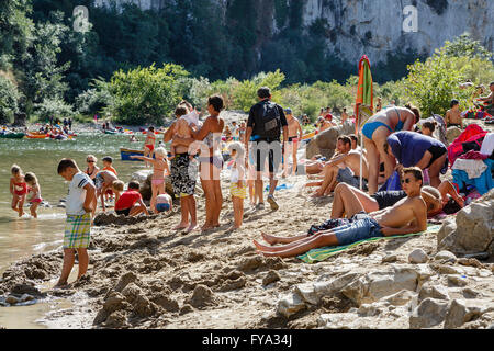 The crowded beach at Pont d'Arc, River Ardèche, Ardèche, France Stock Photo