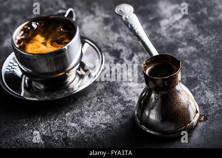Coffee. Turkish coffee. Armenian Turkish coffee. Cezve and cup of coffee. Traditional serving coffee. Stock Photo
