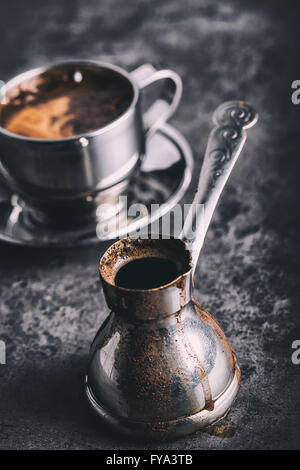 Coffee. Turkish coffee. Armenian Turkish coffee. Cezve and cup of coffee. Traditional serving coffee. Stock Photo