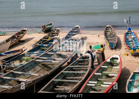 Fishing boats at the coast at Tanjih fish market, the biggest African fish market, Gambia, Africa Stock Photo