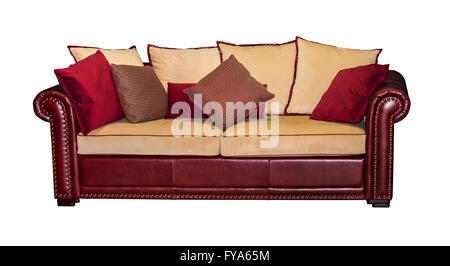 Leather red sofa with pillows isolated Stock Photo