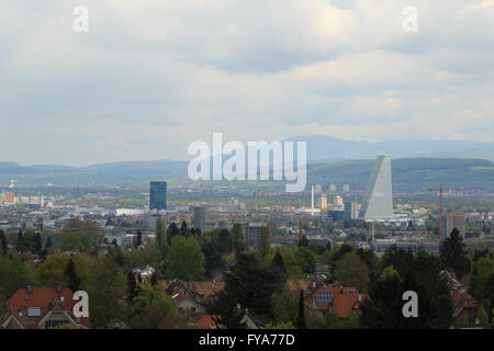 A photograph of the new Roche Tower (Building 1, or Bau 1) in Basel, Switzerland, taken from atop a water tower in Bruderholz. Stock Photo