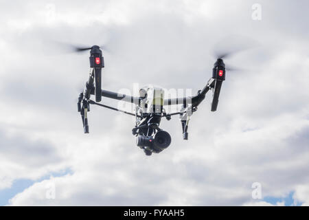 Remotely piloted DJI Inspire drone in flight Stock Photo