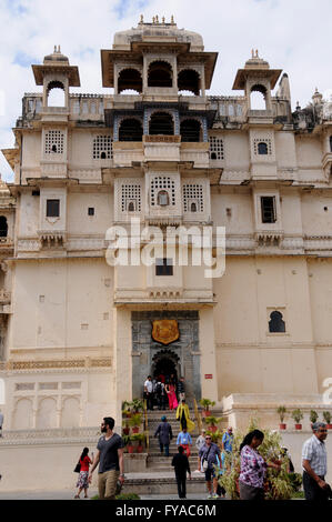 Tourists entering the City Place Museum in the city of Udaipur. The City Palace is the city's most visited tourist attraction. Stock Photo