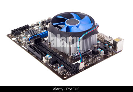 Computer motherboard isolated on white background with CPU cooler Stock Photo