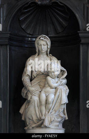 White marble statue of Madonna and Child (1504) created by Michelangelo at the Church of Our Lady in Bruges, Belgium Stock Photo