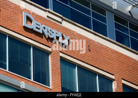 A logo sign outside of the headquarters of Dentsply Sirona in York ...