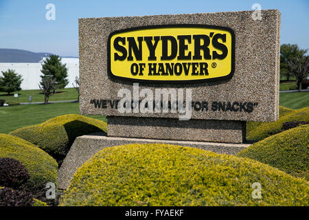 A logo sign outside of the headquarters of Snyder's Of Hanover in Hanover, Pennsylvania on April 17, 2016. Stock Photo