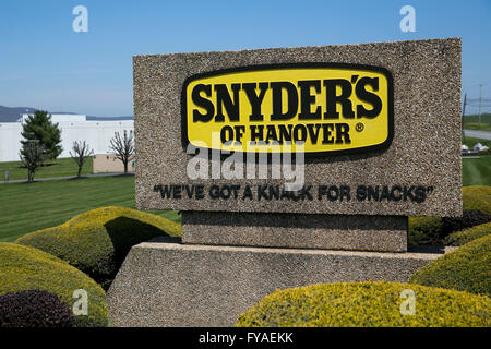 A logo sign outside of the headquarters of Snyder's Of Hanover in Hanover, Pennsylvania on April 17, 2016. Stock Photo