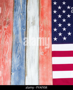 USA flag border on vertical rustic painted wooden boards in national colors of country. Stock Photo
