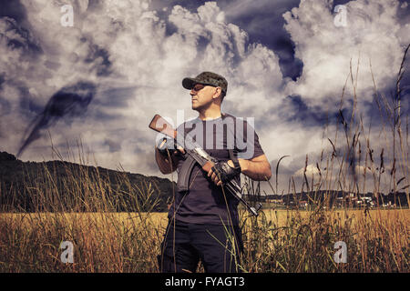 masked militant with a submachine gun by tactical operation Stock Photo