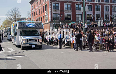 Mitzvah Tanks parading past Lubavitch headquarter to celebrate the birthday of the Lubavitcher Rebbe Menachem Mendel Schneerson. Stock Photo