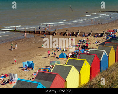 The Golden Sandy Beach and Colourful Beach Huts at Mundesley, Norfolk, England Stock Photo