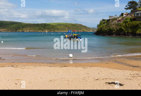 South sands beach Salcombe Devon UK with the sea tractor ferry carrying passengers to the shore Stock Photo