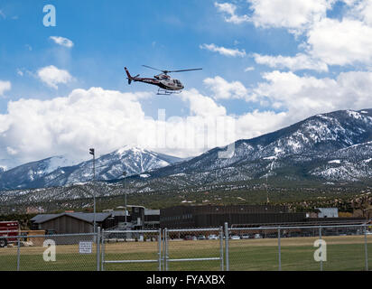 'Reach' Flight for Life medical helicopter landing on high school field Stock Photo