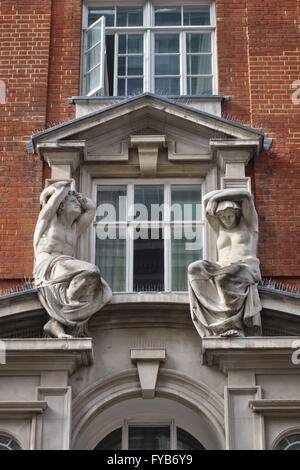 House in Mortimer Street, London W1, UK. Statues of Atalante and Caryatid by Farmer & Brindley (1896) Stock Photo