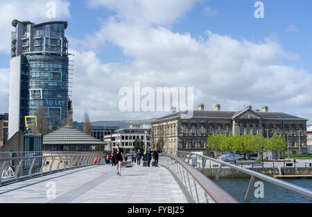 Belfast, UK, 25th April 2016. UK weather. A jogger crosses the Lagan Footbridge on a bright and breezy day in Belfast. Credit:  J Orr/Alamy Live News Stock Photo