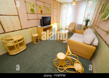 Hotel apartments interior with rattan furniture in oriental style Stock Photo