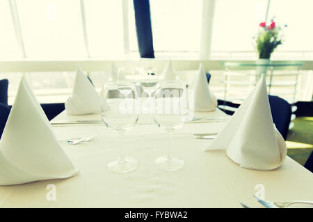 close up of table setting with glasses and cutlery Stock Photo