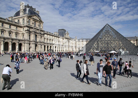 Cityscape Paris Louvre museum and the Pyramid at the Louvre Stock Photo