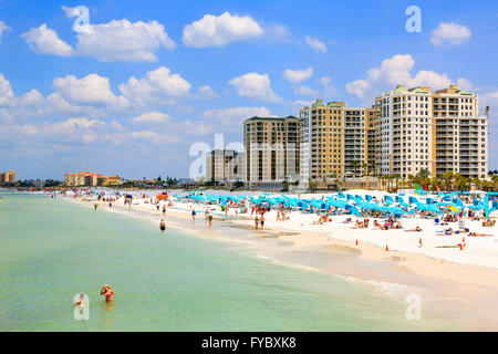 Waterfront hotels and people on Clearwater beach Florida, voted the number one beach in America Stock Photo
