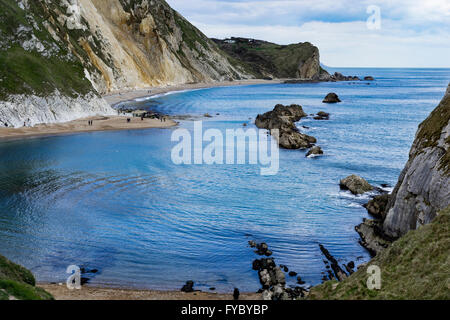 View from above Durdle Door over Man O'War Beach and St Oswald's Bay, Dorset, UK Stock Photo