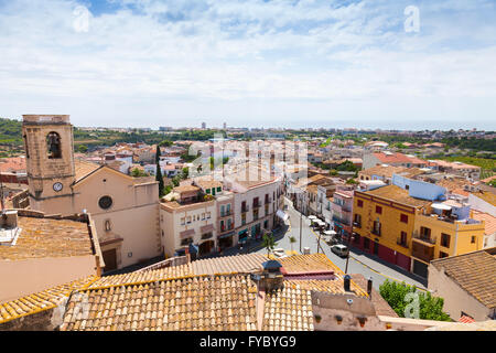 Calafell, Spain - August 17, 2014: Cityscape of Spanish town Calafell in summer. Bell tower and red tiling roofs in old part of Stock Photo
