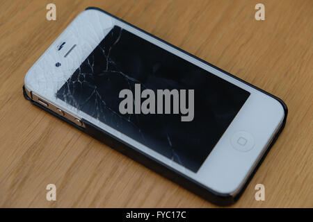 Cracked damaged iPhone 4S Stock Photo