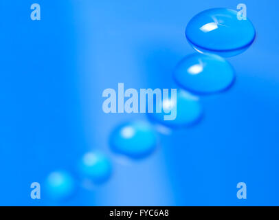 macro shot of blue water drops Stock Photo