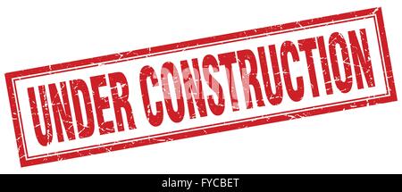 under construction red square grunge stamp on white Stock Vector