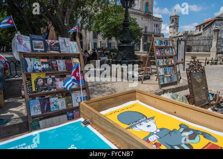 The main tourist square of Old Havana 'Plaza de Armas' hosts a daily second hand market selling books, relics, collectables and posters.  Cuba Stock Photo