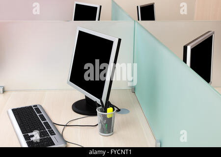 computers on a desk in a modern office Stock Photo