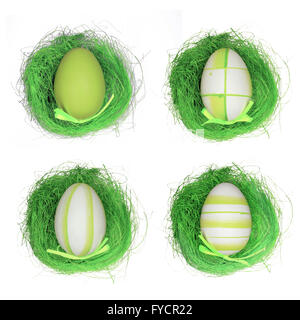 Four easter eggs on artificial grass isolated white Stock Photo