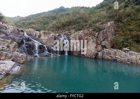 Ham Tin Wan waterfalls and rock pools Stock Photo