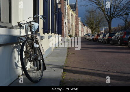 Alkmaar, Netherlands - March 27, 2016: People cycling on road Stock Photo