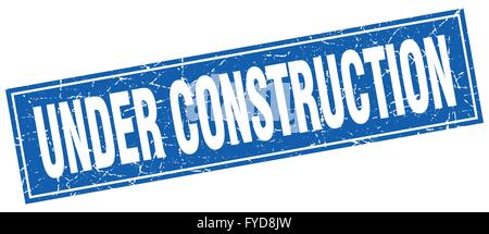 under construction blue square grunge stamp on white Stock Vector