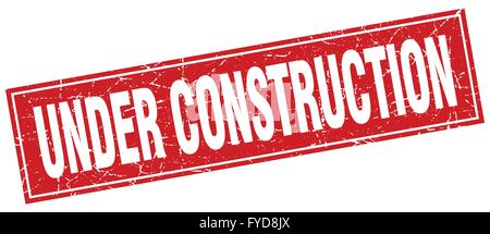 under construction red square grunge stamp on white Stock Vector