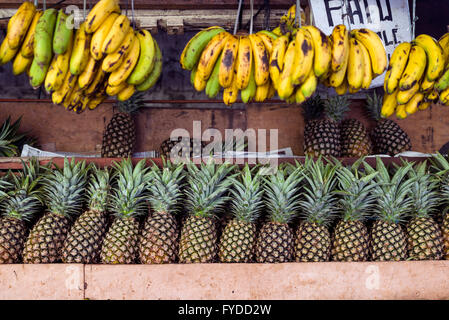 Bananas and pineapples on the counter in Philippines iloilo city. Stock Photo