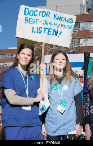 St George's Hospital, London, UK. 26th April, 2016.  (left to right) Eleanor Stanger (27) A E Trainee and Emily Durie (26) Onolgy trainee join the Junior Doctors Strike outside St George's Hospital in Tooting Broadway. Today is the first ever of a two day all-out strike held across the country by Junior Doctors. Credit:  Jeff Gilbert/Alamy Live News Stock Photo