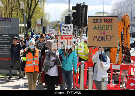 Manchester, UK. 26th April, 2016. A protester with a placard which reads 'it's not about the money' in Manchester, UK, 26th April, 2016 Credit:  Barbara Cook/Alamy Live News