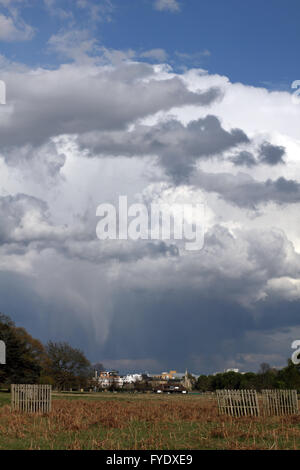Bushy Park, London, UK. 26th April 2016. UK Weather: Huge cumulonimbus clouds pass over Kingston Upon Thames as seen from Bushy Park, on an afternoon of sunshine and showers in SW London. Credit:  Julia Gavin UK/Alamy Live News Stock Photo